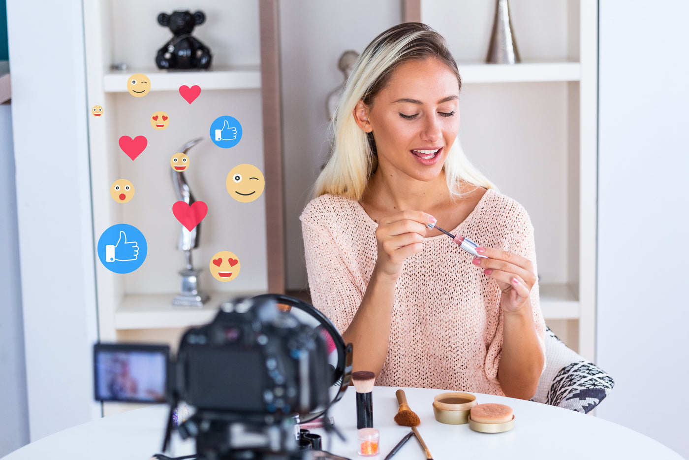 Woman in front of a camera applying Builder Gel