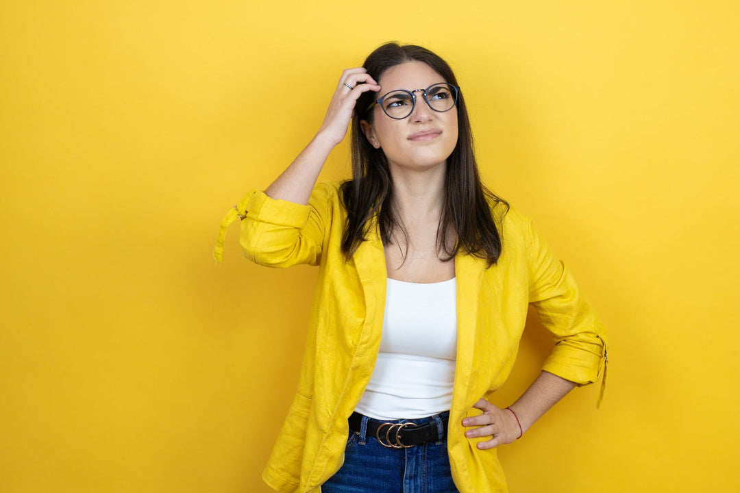 Woman scratching head as if she's confused